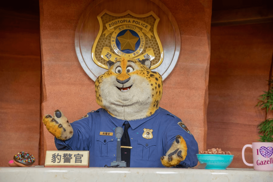 An animatronic of Officer Clawhauser, a police officer in Zootopia.